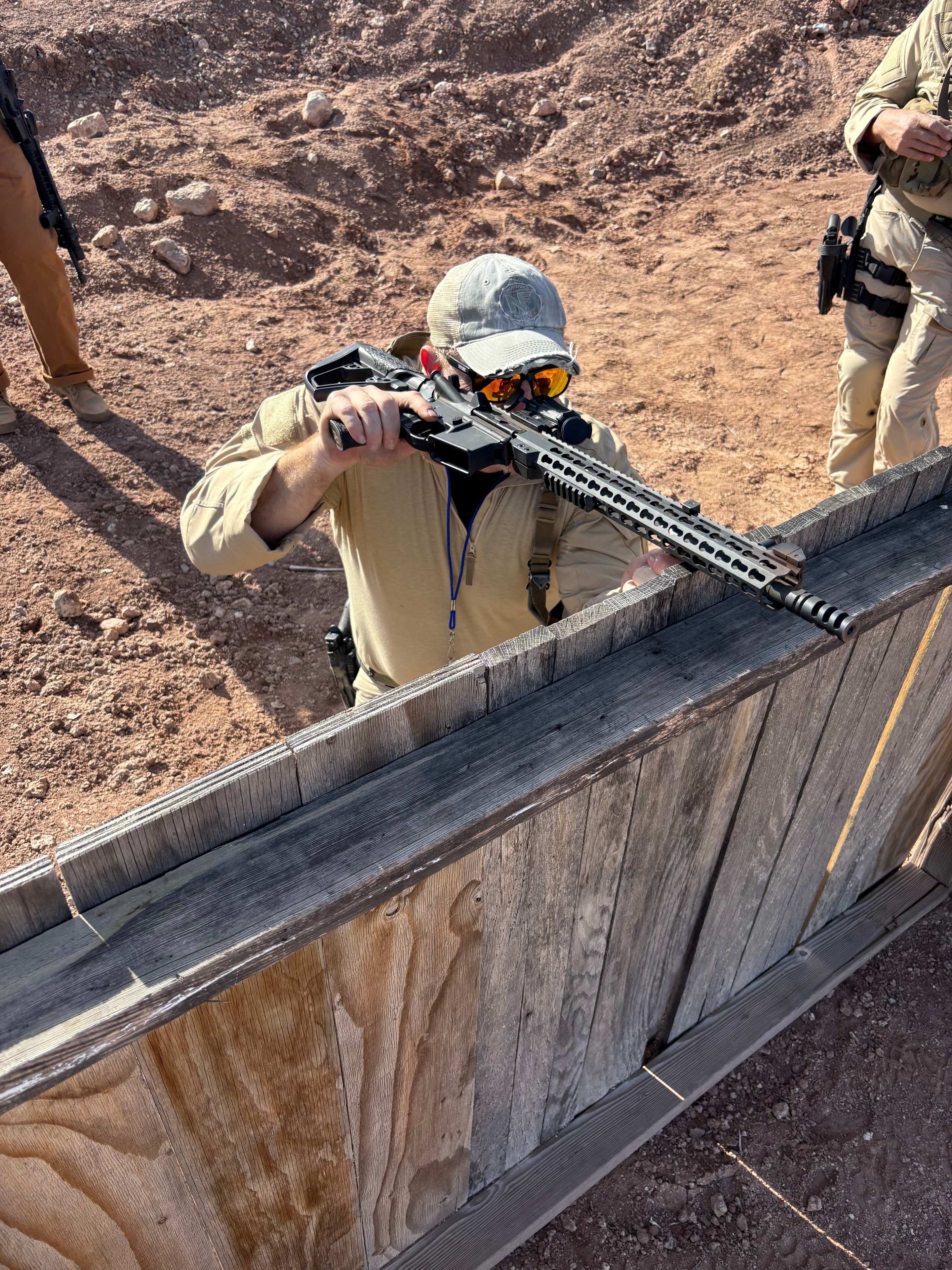 Shooter aiming rifle at target during Veritus Shooting Group carbine training course