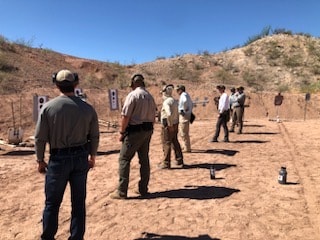Law enforcement and civilian students training at Veritus Shooting Group outdoor range near Phoenix AZ