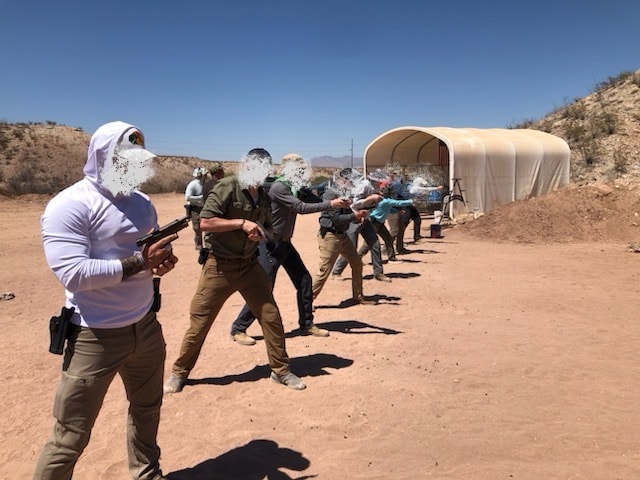 Tactical shooting course in progress at Veritus Shooting Group outdoor desert range