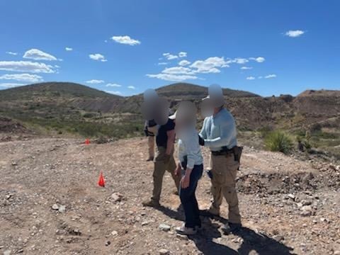 Veritus Shooting Group students reviewing range map and course layout before drill