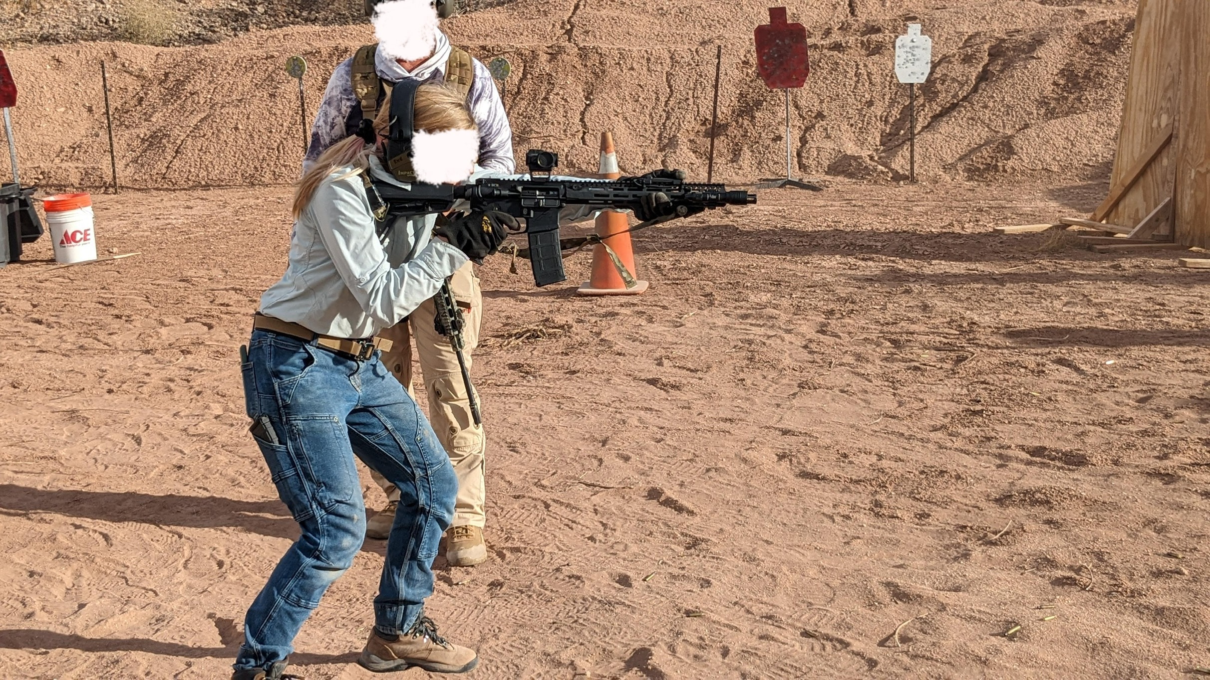 Shooter running a timed drill at Veritus Shooting Group veteran-led training range